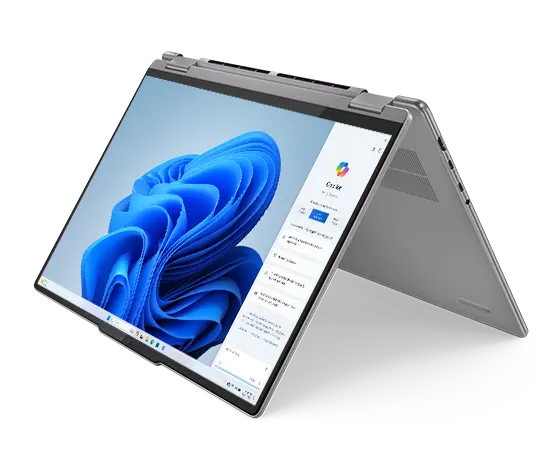 The Lenovo Yoga 7 2-in-1 Gen 9 (16 AMD) in tent mode with a Windows CoPilot screen on the display