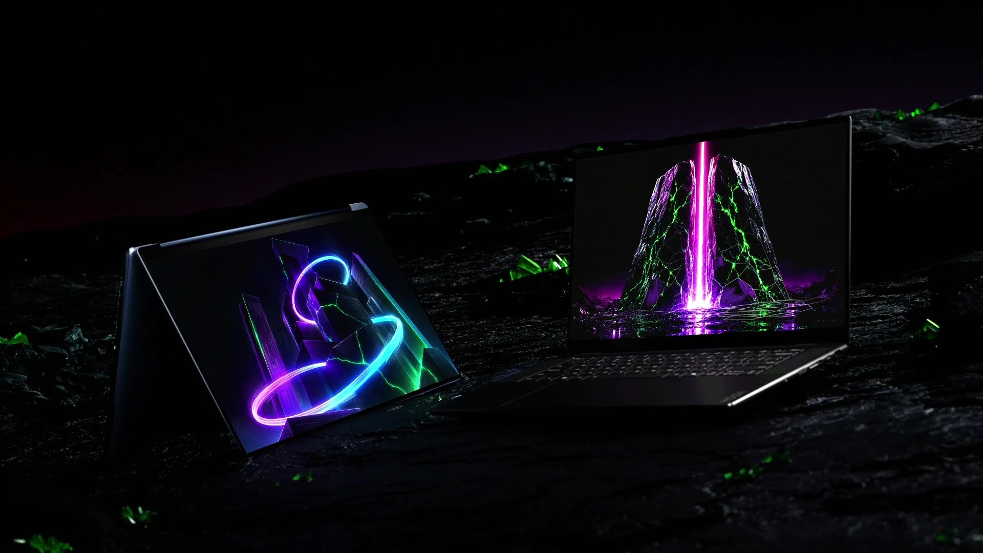 Two NVIDIA RTX Spark Superchip-powered Yoga laptops — one in laptop mode, one in tent mode, with blue, green, purple, and pink graphics on their displays.