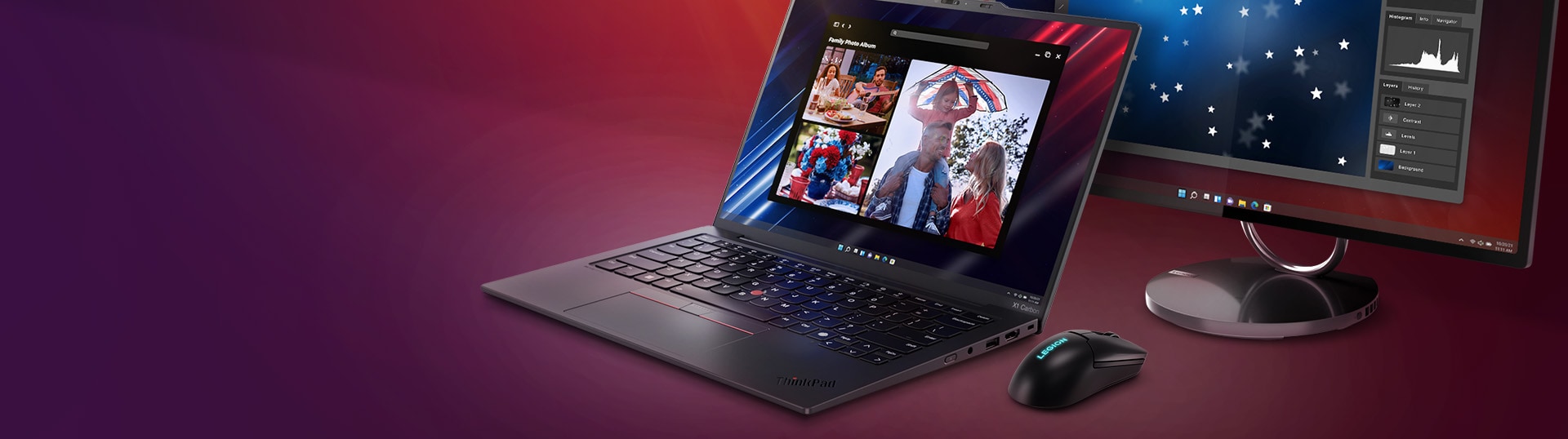 A ThinkPad laptop displaying a family photo, a Lenovo monitor, a lenovo mouse, everything over a purple surface.