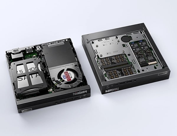 Two Lenovo ThinkCentre M80q Gen 4 Tiny (Intel) PC laid flat, one with left-side panel removed, one with right-side panel removed, showing internal components