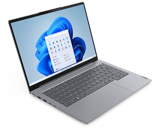 Overhead shot of Lenovo ThinkBook 14 Gen 6 laptop showing display with Windows 11 Start menu, keyboard, & left-side ports & slots.