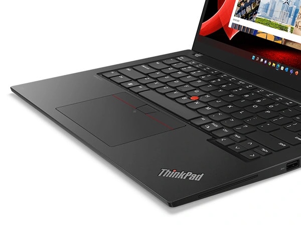 Cropped, close-up of the keyboard with TrackPoint & trackpad on the Lenovo ThinkPad T14s Gen 4 laptop.