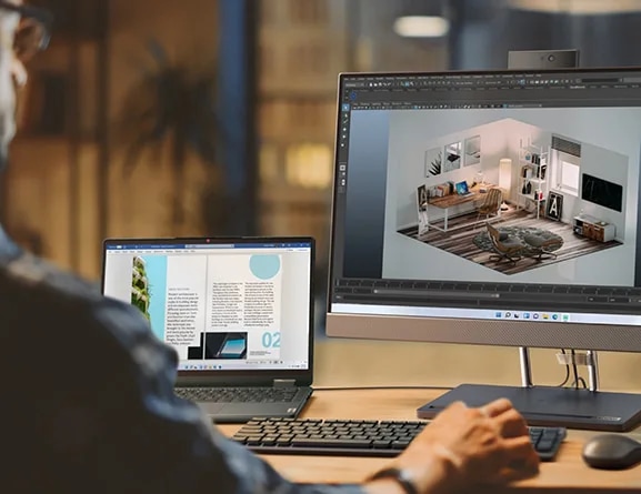 IdeaCentre AIO 5i Gen 7 front facing with 3D rendering program on screen and laptop connected via One Cable Link technology.