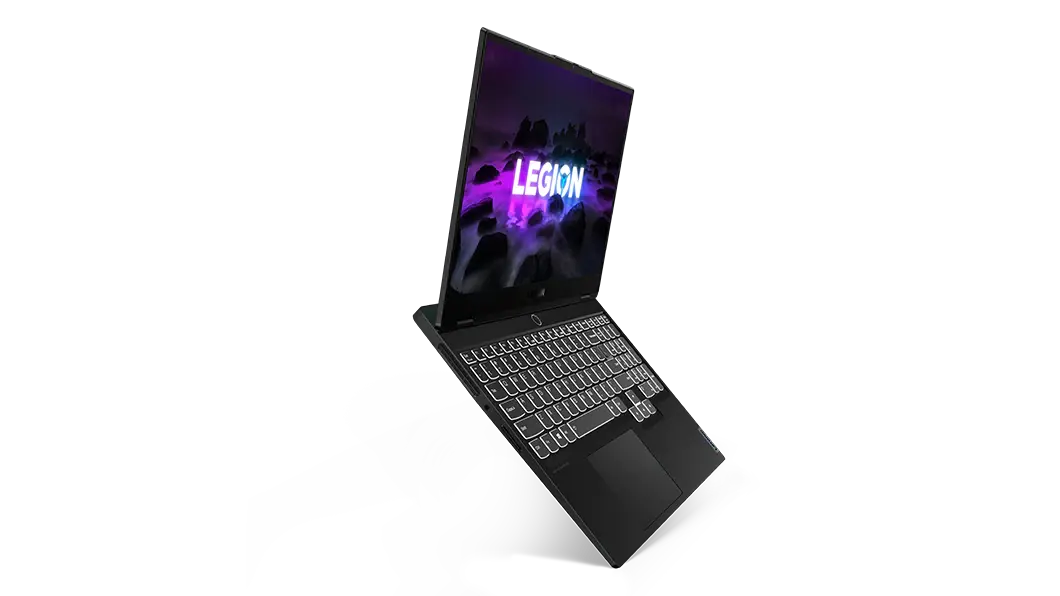 Imagen desde la izquierda de la laptop gamer Lenovo Legion Slim 7 6ta Gen apoyada en una de sus puntas, con el teclado retroiluminado