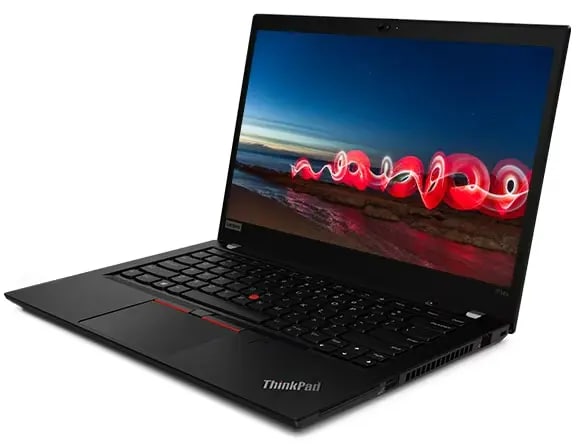 A side view of the ThinkPad P14s Mobile Workstation, showing the keyboard and the display showing a beach at night