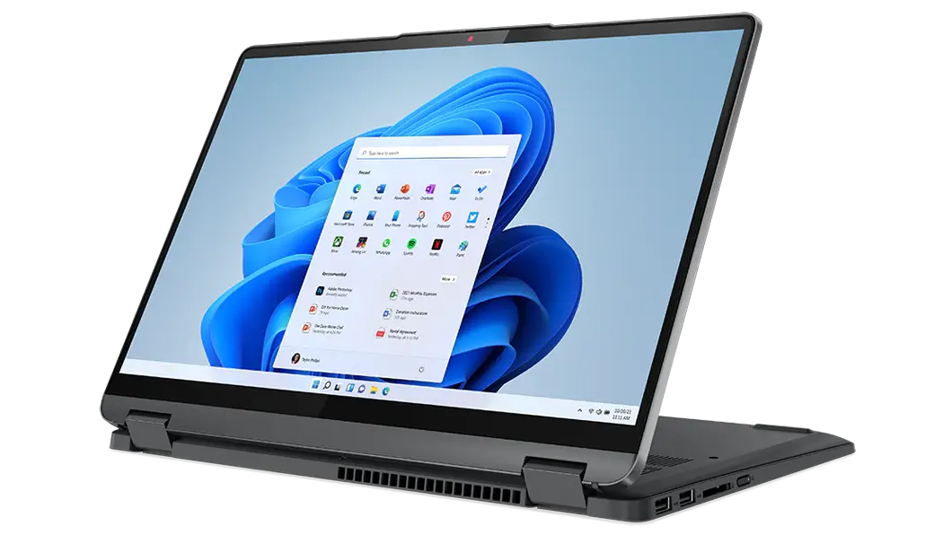 Imagen de semiperfil derecho de la portátil IdeaPad Flex 5i 7ma Gen (14″, Intel) en modo atril (stand), en color storm grey (gris tormenta)