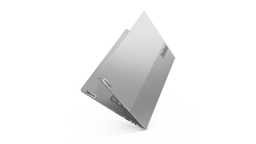 Imagen de la portátil semicerrada Lenovo ThinkBook 14 Gen 3 (14&quot;, AMD) apoyada en uno de sus bordes