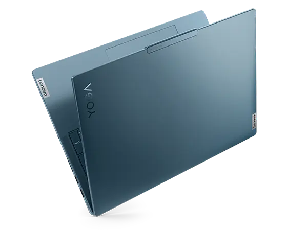 The Lenovo Yoga Pro 9i Gen 9 (16 Intel) in Tidal Teal, opened in a V shape showing the top cover