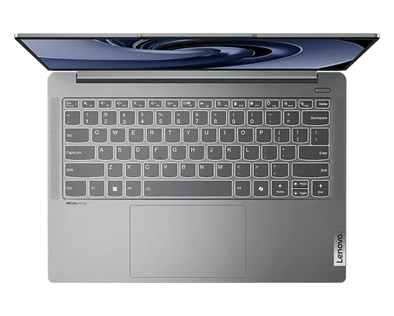 Overhead shot of Lenovo IdeaPad Pro Gen 9 14 inch laptop with open lid, focusing on speaker and keyboard.