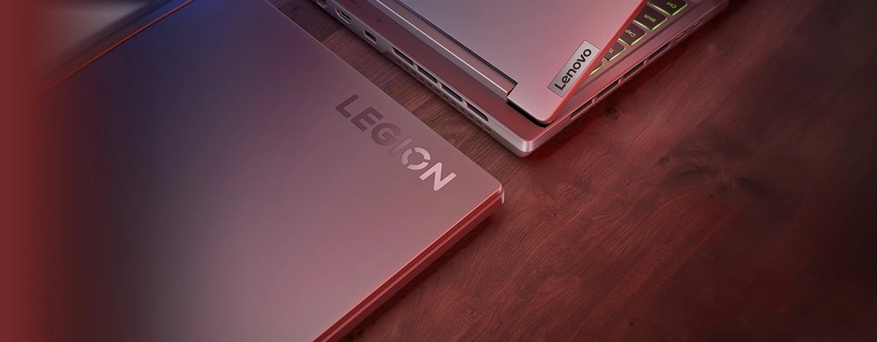 Closeup of two Legion Slim 5 Gen 9 (16 AMD) models, showing the Lenovo and Legion logos