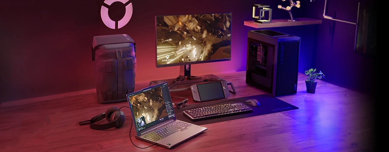 The Legion Slim 5 Gen 9 (16 AMD) surrounded by other elements of the Legion Gaming ecosystem, such as a monitor, keyboard, mouse, headset, and more.