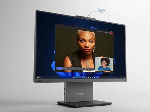 Lenovo ThinkCentre Neo 50a Gen 5 24 inch Intel monitor -- front-left angled view, with a two-person videoconference on the display and the 5MP camera labeled