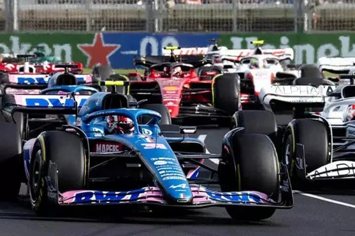 Formula 1 racecars lined up to start a race