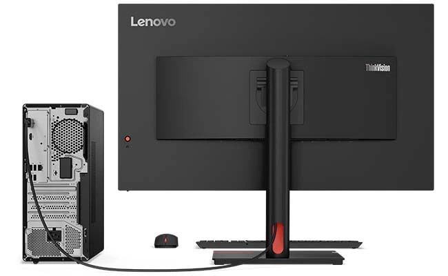 Mặt sau của máy tính để bàn dạng tháp Lenovo ThinkCentre M70t Gen 5, hiển thị các cổng và khe cắm, được kết nối với màn hình, có bàn phím không dây và chuột.