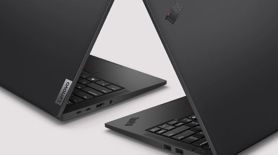 A cropped picture of two Lenovo ThinkPad T14s Gen 6 notebook computers placed at right angles, with a close-up showing details of the back cover, side ports and keyboard.