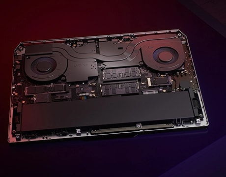 The Lenovo LOQ 15ARP9’s internal mechanics, showing battery and thermal vents