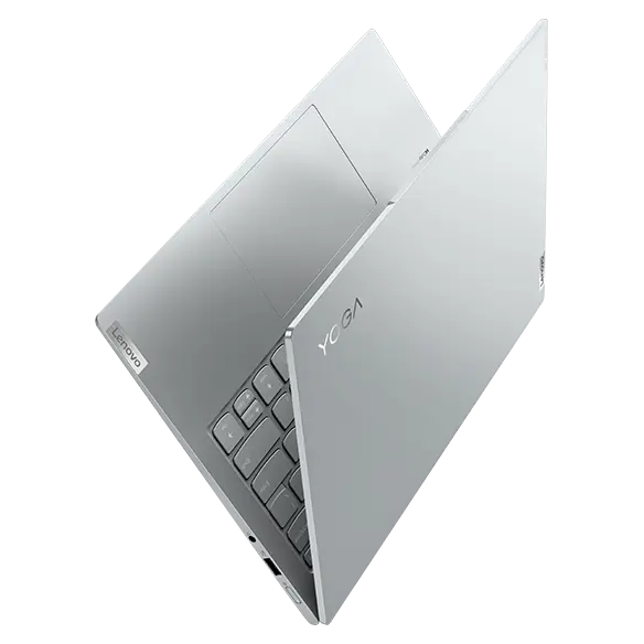 Lenovo Yoga Slim 7i Pro Gen 7 laptop slightly open, showing keyboard and touchpad