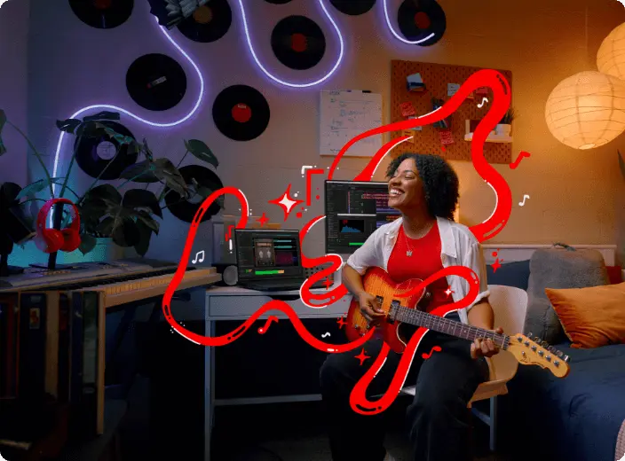 A person playing an electric guitar while sitting in front of a table with a Lenovo laptop and monitor on it, in front of a wall with vinyl records and an interweaving purple neon light mounted on it, with red wavy lines superimposed.