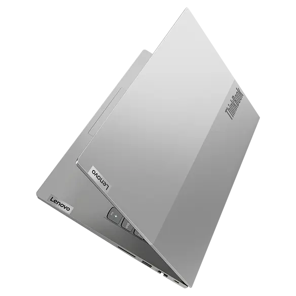 Lenovo ThinkBook 14 Gen 5 laptop floating on its spine like a book, showing dual tone cover.
