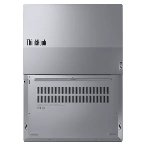 Rear, top view of Lenovo ThinkBook 14 Gen 7 (14 inch Intel) laptop opened at 180 degrees, focusing its top cover highlighting the ThinkBook logo & bottom cover highlighting its vents.