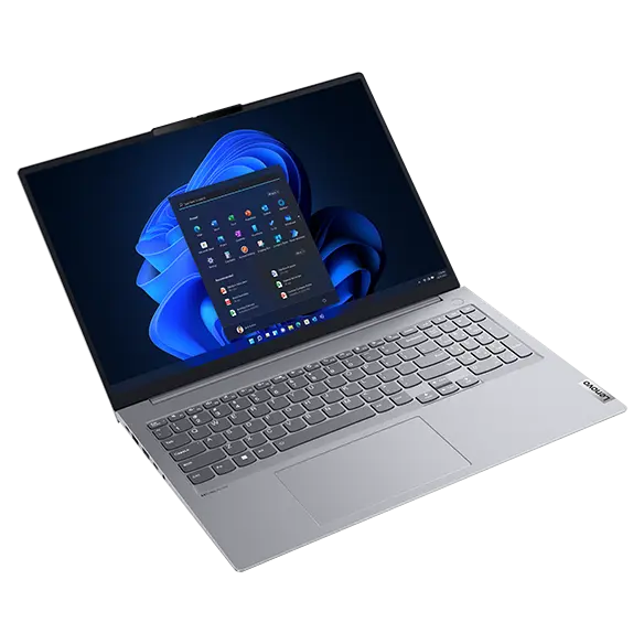 Lenovo ThinkBook 16 Gen 4 laptop open 90 degrees, showcasing Windows 11 Home on display, keyboard, & left-side ports.