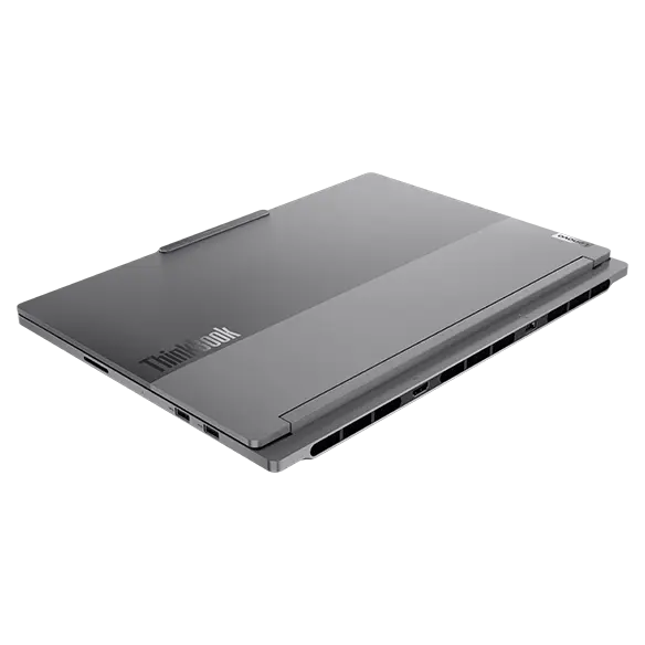 Rear, right side, slant view of the Lenovo ThinkBook 16p Gen 5 (16” Intel) laptop with lid closed & ThinkBook logo displayed on lid top.