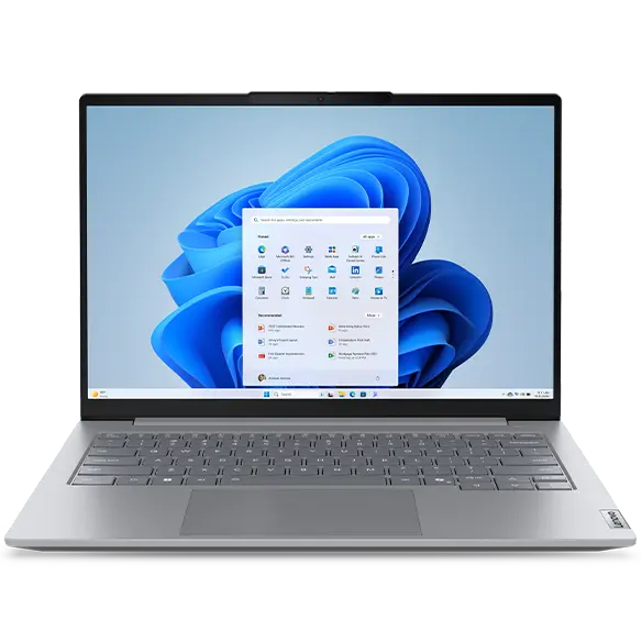 Lenovo ThinkBook 14 Gen 8 (14 inch Intel) laptop, focusing its thin bezels, full-size keyboard, & a Windows 11 Pro menu opened on screen with some app icons.