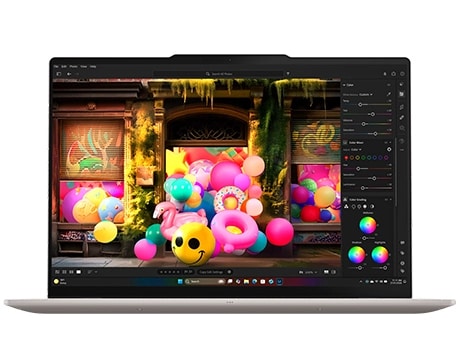 Lenovo Yoga Slim 7i Ultra Gen 11 Aura Edition 14 Front view, with colorful balls and tubes emerging from the display, of the Lenovo Yoga Slim 7i Ultra Gen 11 Aura Edition (14” Intel).