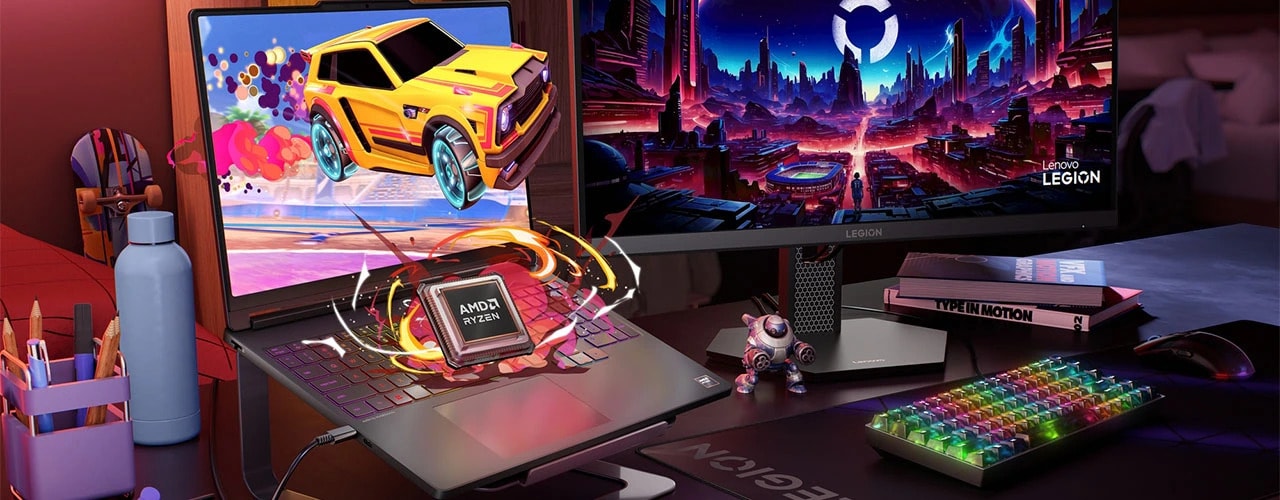 Lenovo Legion 5 5YMJ | 15.3" WQXGA 165Hz | AMD Ryzen AI 7 450 |16GB DDR5 | 1TB SSD | 5050 8GB | 440 AI TOPS 13 Gaming laptop with AMD Ryzen chip effect and RGB keys, beside a monitor—Lenovo Legion 5a Gen 11 (15" AMD).