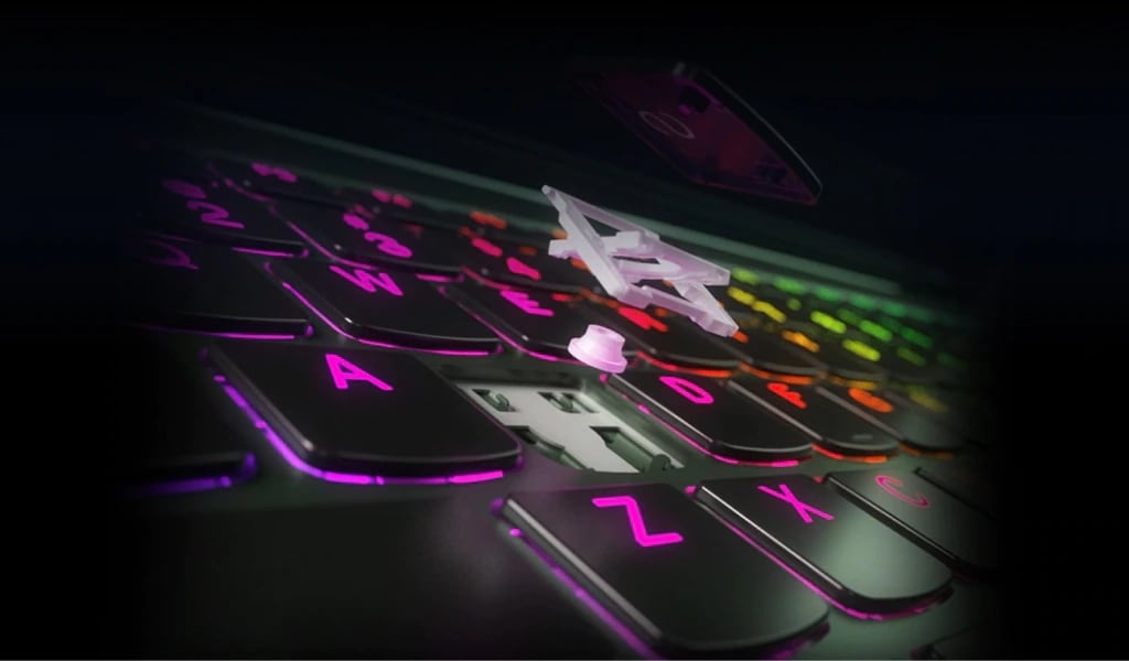 Up close view of Lenovo keyboard and track button with colorful backlighting