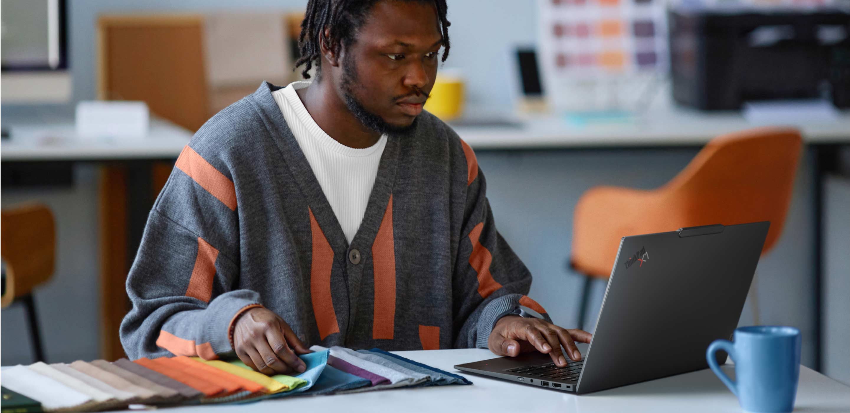 Man using Lenovo laptop