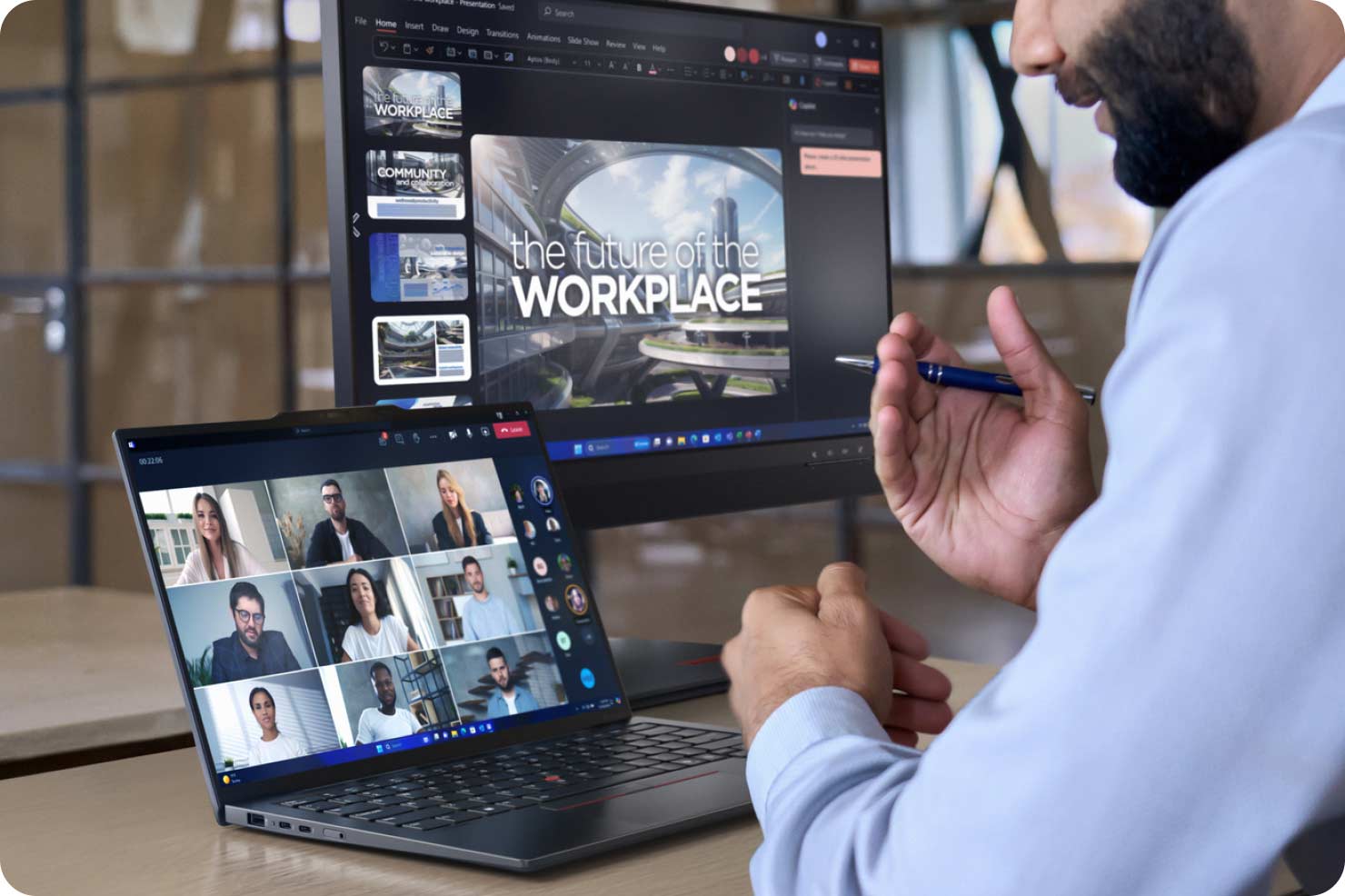 man using two computers