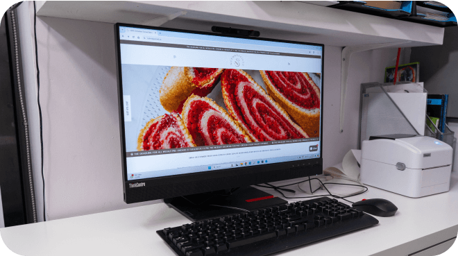 desktop computer with picture of pastry on screen