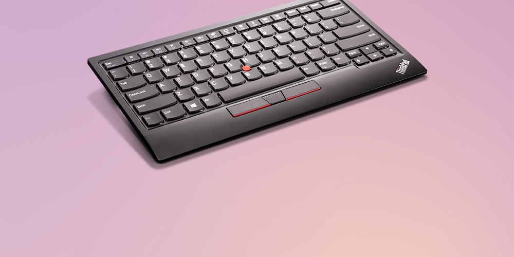 A ThinkPad TrackPoint Keyboard II is featured on a background
