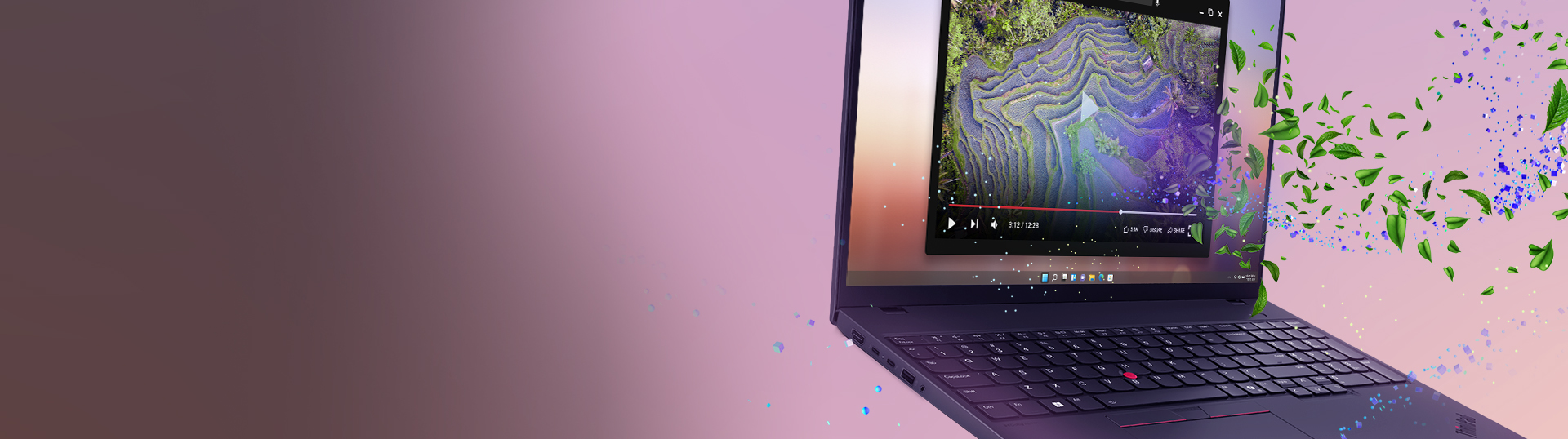A collection of four laptops arranged in an artistic layout against a deep red background