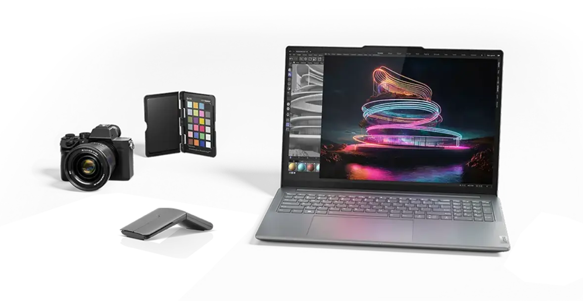 A Lenovo Yoga laptop amidst a variety of accessories and devices
