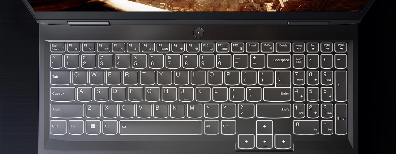 Lenovo LOQ 16IRH8 gaming laptop—closeup of keyboard showing white backlighting