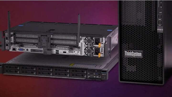 Image of two Lenovo servers stacked on top of each other with a computer tower next to them. 