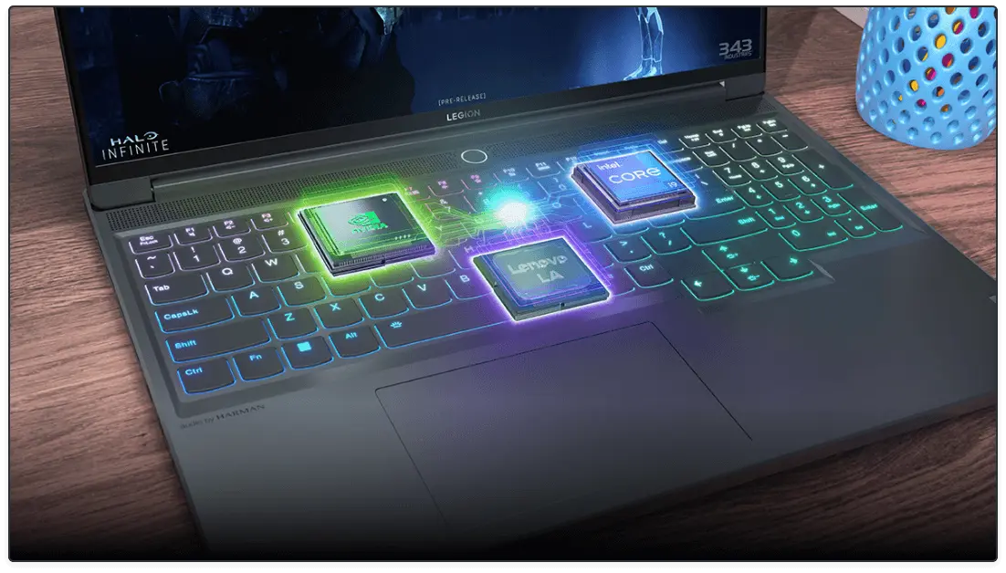 Closeup of a Lenovo Legion gaming laptop keyboard, with graphical highlights of the processing and graphics chips.