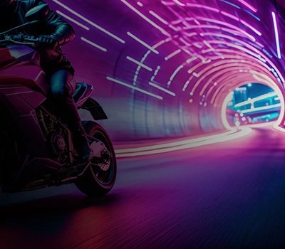 A purple tunnel with white motion lines decorating the interior