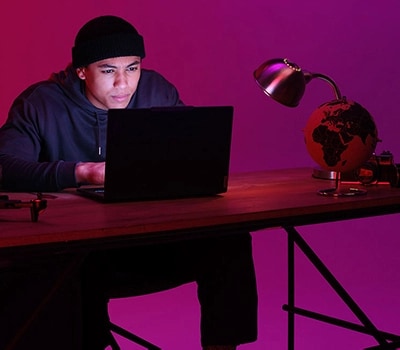 A young person working on a Yoga Pro at a desk