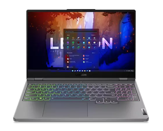 Vue avant du Legion 5 Gen 7 (15" AMD) avec Windows 11 à l’écran et éclairage RVB du clavier activé