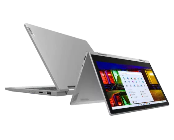 Two silver Lenovo IdeaPad Flex 3 11 ADA laptops, one positioned in left three-quarter view and one positioned in right three-quarter view tent mode. 