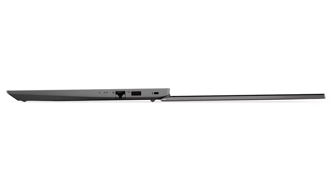 Left side profile of Lenovo V14 Gen 3 (14, AMD) laptop, opened 180 degrees flat, showing ports and edge of display