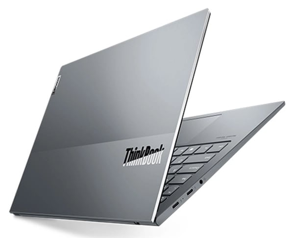 Rear-left view of a Cloud Gray Lenovo ThinkBook 13x laptop, floating as if held at an angle, highlighting the thin chassis that’s kept cool with Intelligent Cooling features.