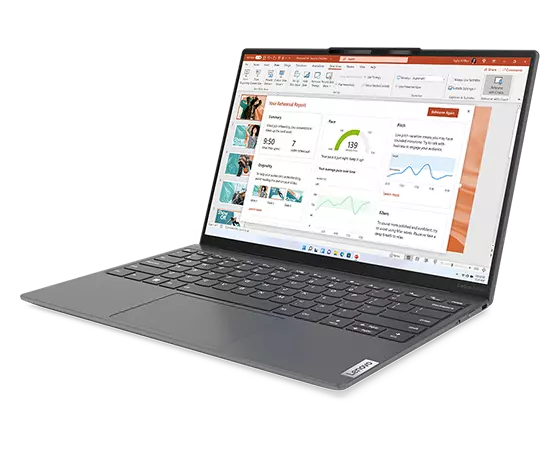 Yoga Slim 7i Carbon laptop at an angle, opened, showing keyboard, trackpad, display with PowerPoint presentation, & right-side ports