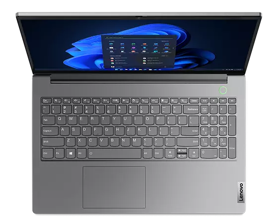 Overhead shot Lenovo ThinkBook 15 Gen 5 (15ʺ AMD) laptop open 90 degrees, with emphasis on keyboard.