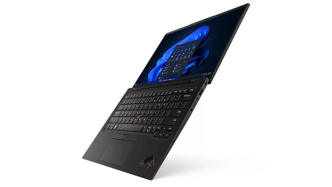 Floating Lenovo ThinkPad X1 Carbon Gen 11 laptop open 180 degrees, angled to show right-side ports, keyboard, & display.