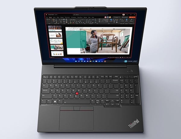 Lenovo ThinkPad E16 (16″ Intel) laptop – front view from slightly above, lid open, with a slideshow on the display