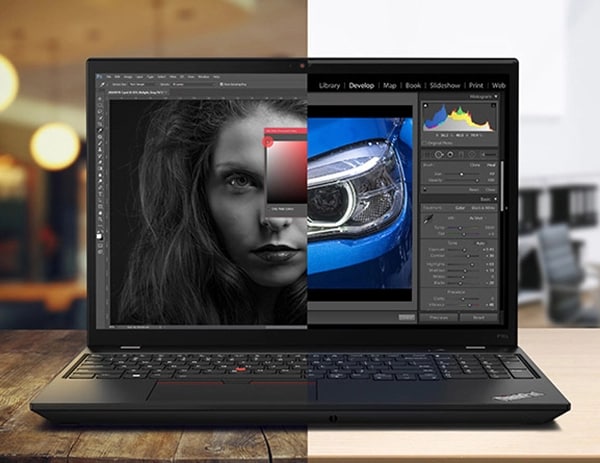 Close up of Lenovo ThinkPad P16s Gen 2 (16″ Intel) laptop, opened, with a photo of a woman on one side of the screen, and a car on the other